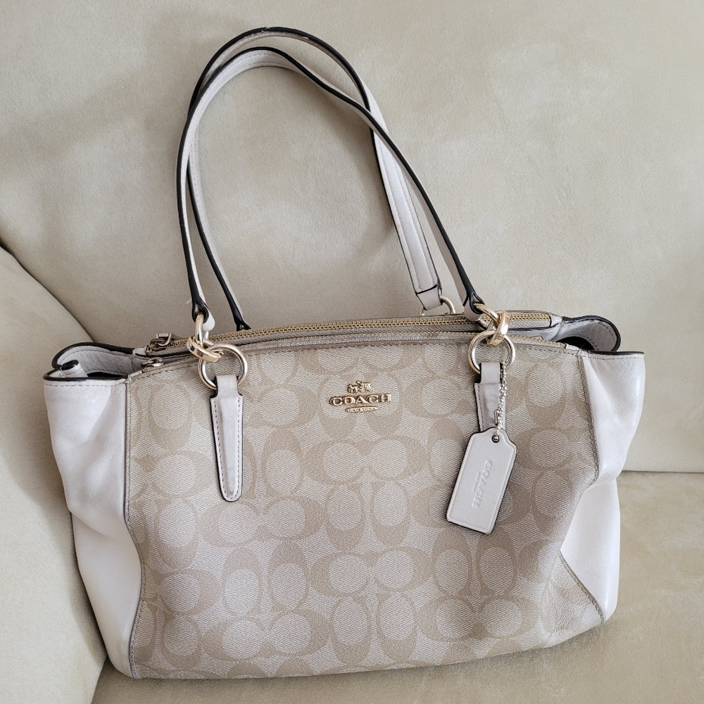 Tan and cream Coach logo bag